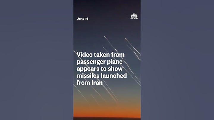 Video taken from passenger plane appears to show missiles launched from Iran
