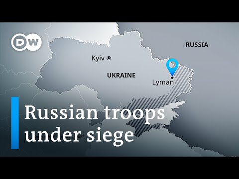 Ukraine troops surround key town in region putin annexed | dw news