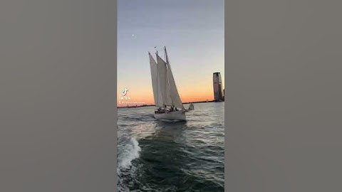 Cruising by Schooner Adirondack at sunset in New York Harbor