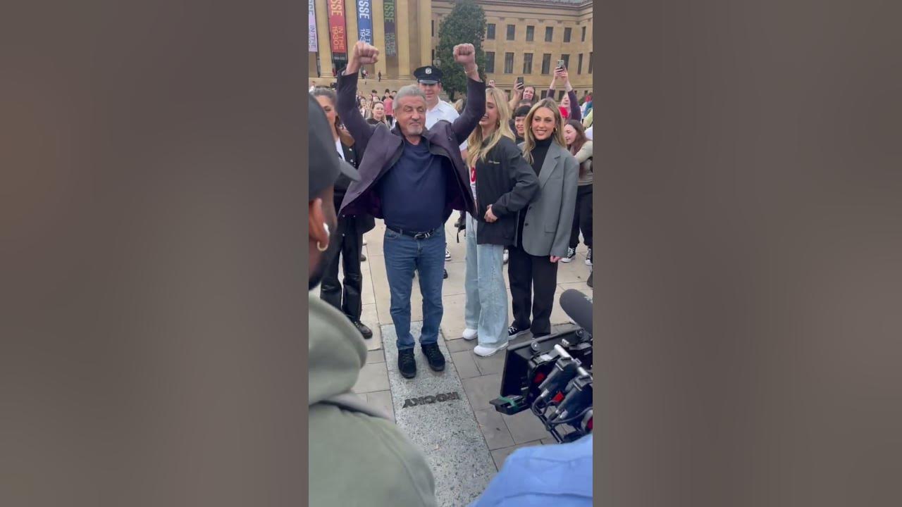 Sylvester Stallone at the Rocky steps in Philadelphia with his family. Great moment.