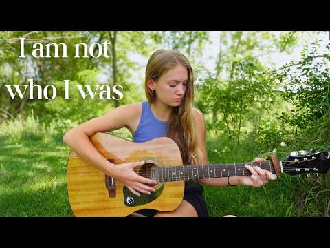 Singing 'i am not who I was' by the woods thumbnail