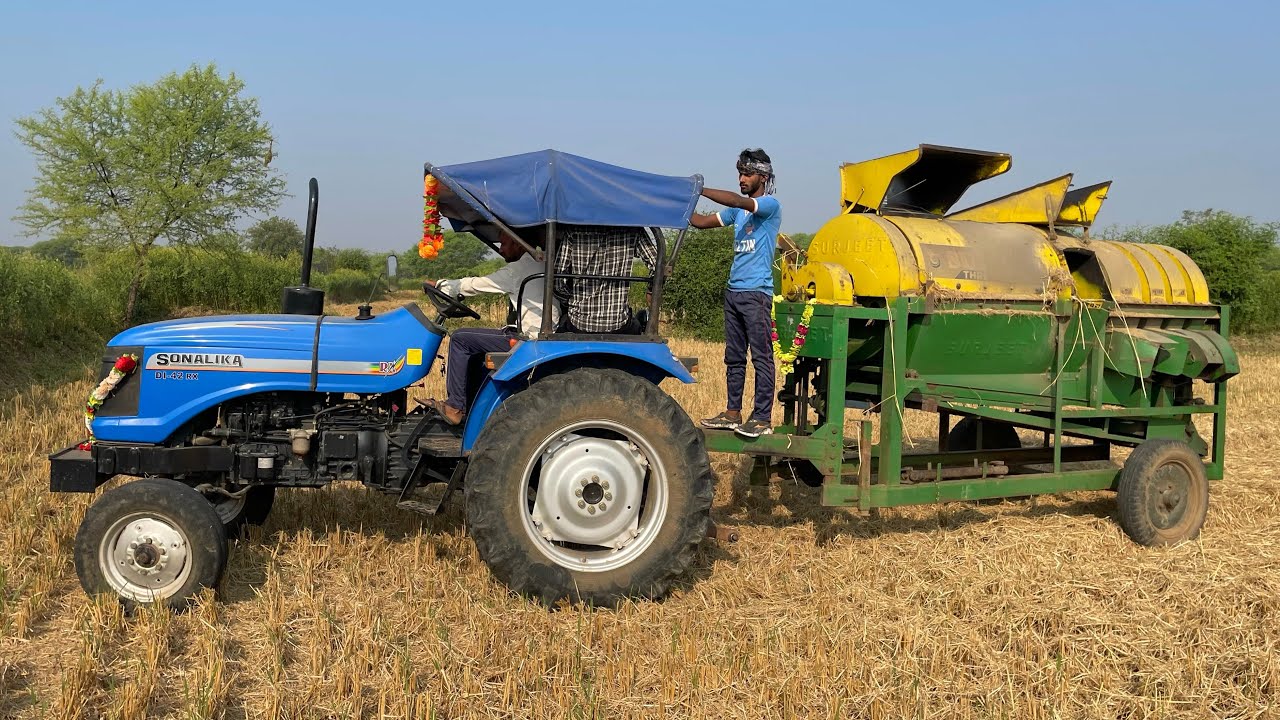 Amezing Surjeet Thresher Machine in a Short Time Tha Rice Cutting | Sonalika 42 Di Tractor