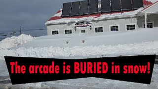 The arcade is buried in Snow.