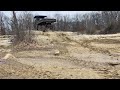 Can-Am Defender 6x6 going up stairstep in the Rock Quarry at the Badlands Off Road Park.