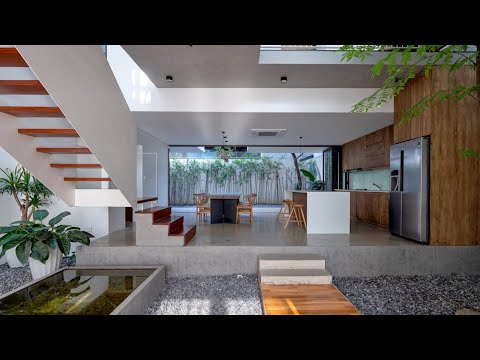 Video: Casa modernă de trei niveluri din Guatemala, care salută natura în interior