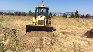 2000 NEW HOLLAND 555E For Sale