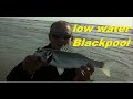 fishing Blackpool's beach at low water