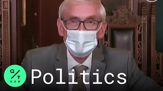 Wisconsin Governor Urges Trump Supporters to Wear Masks at Rally