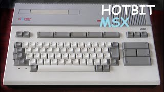 006 CARREGANDO UM JOGO NO ANTIGO COMPUTADOR HOTBIT (SHARP/1985 - MSX) COM TELEFONE CELULAR
