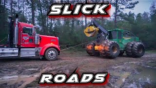 Pull Em In, Pull Em Out, John Deere Skidder Dragging Log Trucks Through Muddy Roads