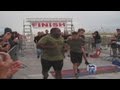 Marine honored for carrying triathlete across finish line