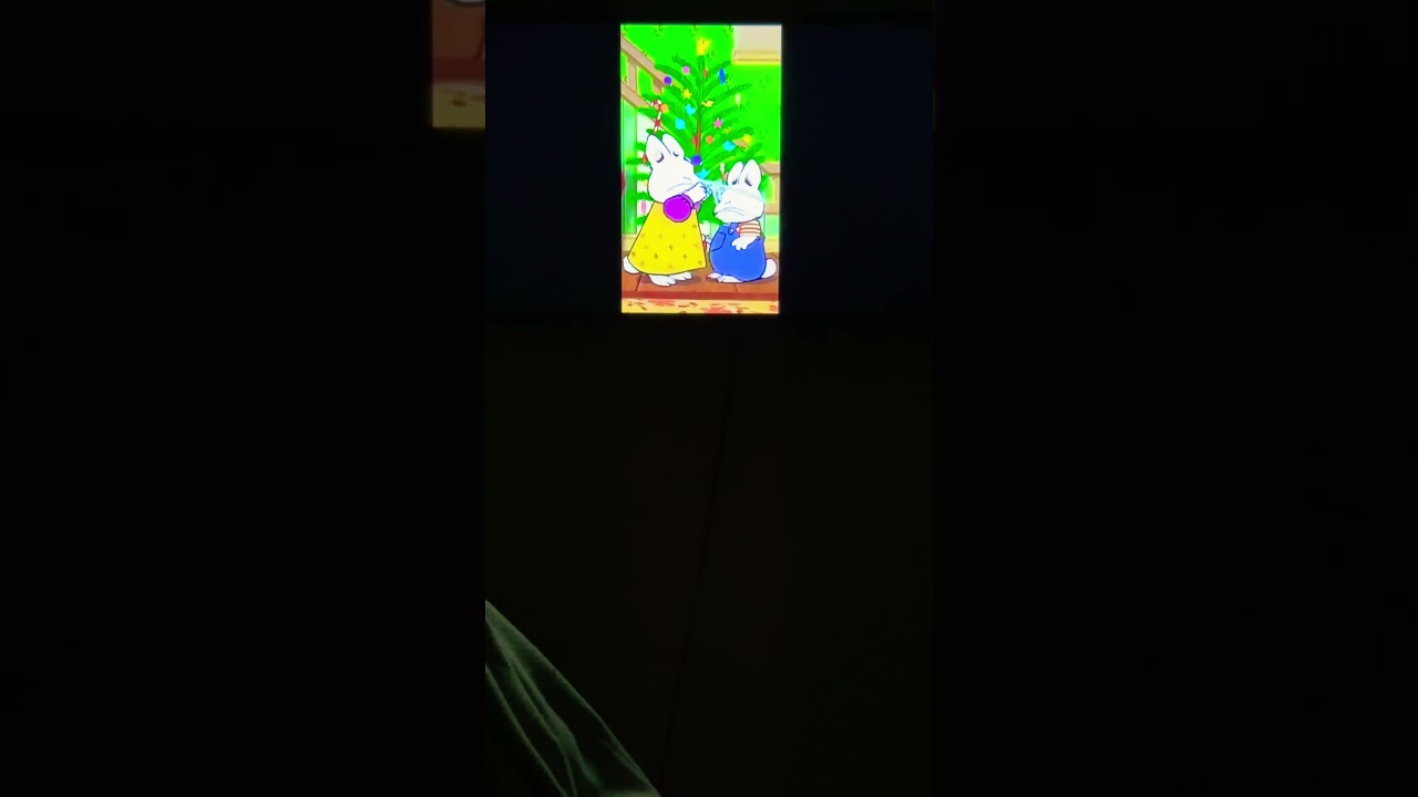 Max and ruby is putting decorations on Christmas tree short video