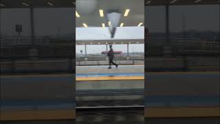 GO Train Kitchener Line passing express through Mount Dennis station