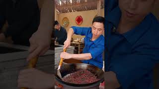 Hunan people prefer Jiu Da Bowl, which is made with wild pepper and black beans. The brothers haven