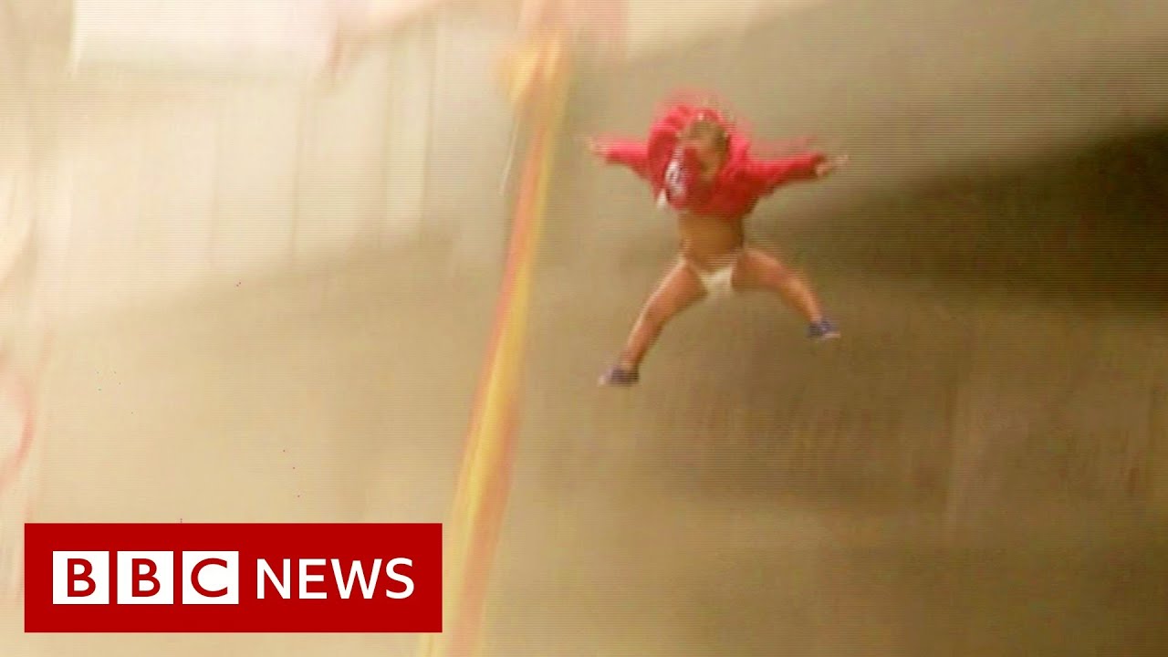 Baby thrown from building 'set on fire by looters' in South Africa