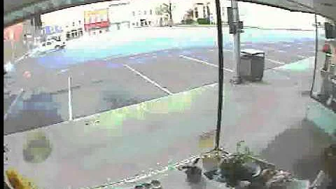 Car Races Across Public Square, Crashes Into Build...