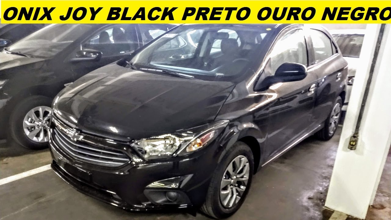 Detalhes novo Chevrolet Onix Hatch turbo LTZ preto ouro negro 2020