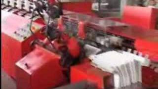 Side gathering of printed forms. Bremer Gathering Machine