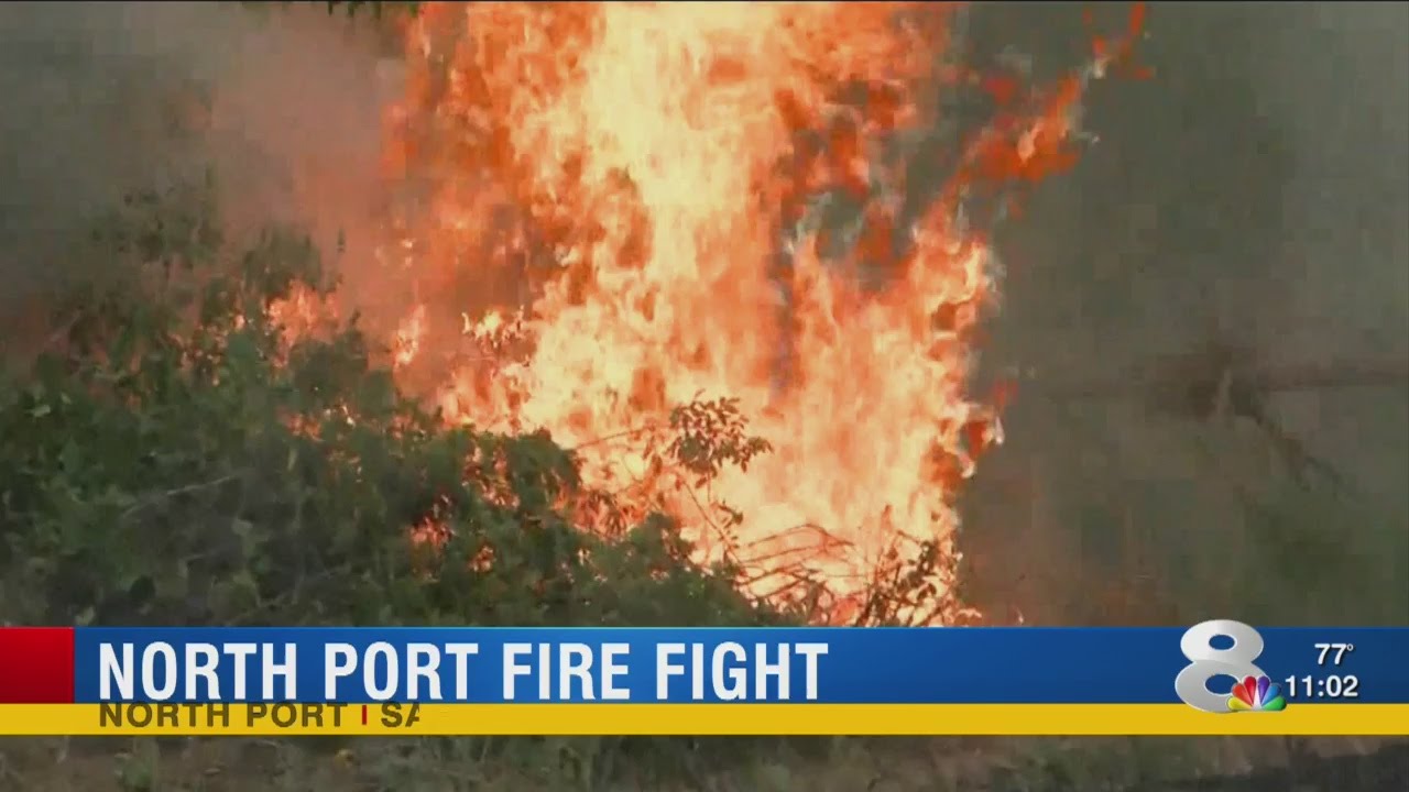 Crews battle massive brush fire in North Port - YouTube