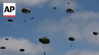 Parachutists recreate DDay jumps from planes used in WWII operation to mark 80th anniversary