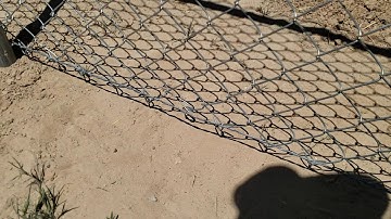 Chain link fence bottom tension wire idea