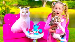 Nastya tổ chức một bữa tiệc trà cho mèo con