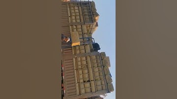 Automatic bale picking and loading machine, bale elevator, using on-board battery 24V and 12V