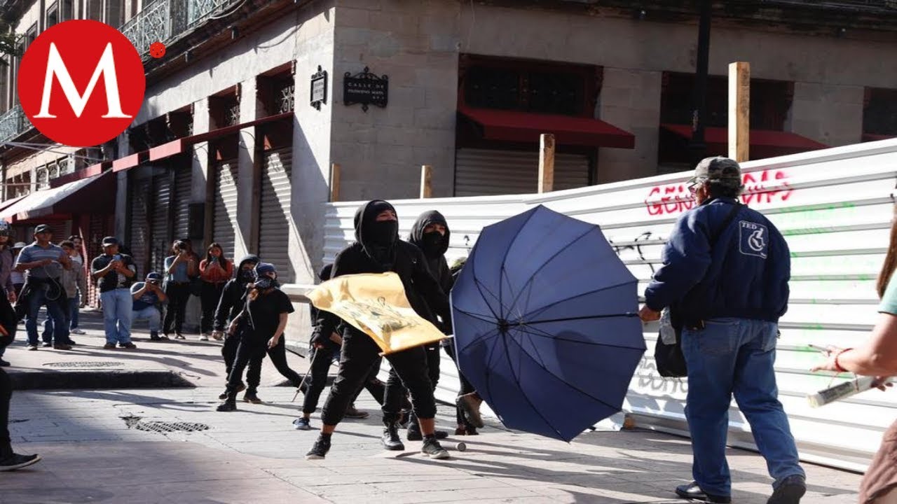 Se registra enfrentamiento entre policías y encapuchados milenio tv youtube