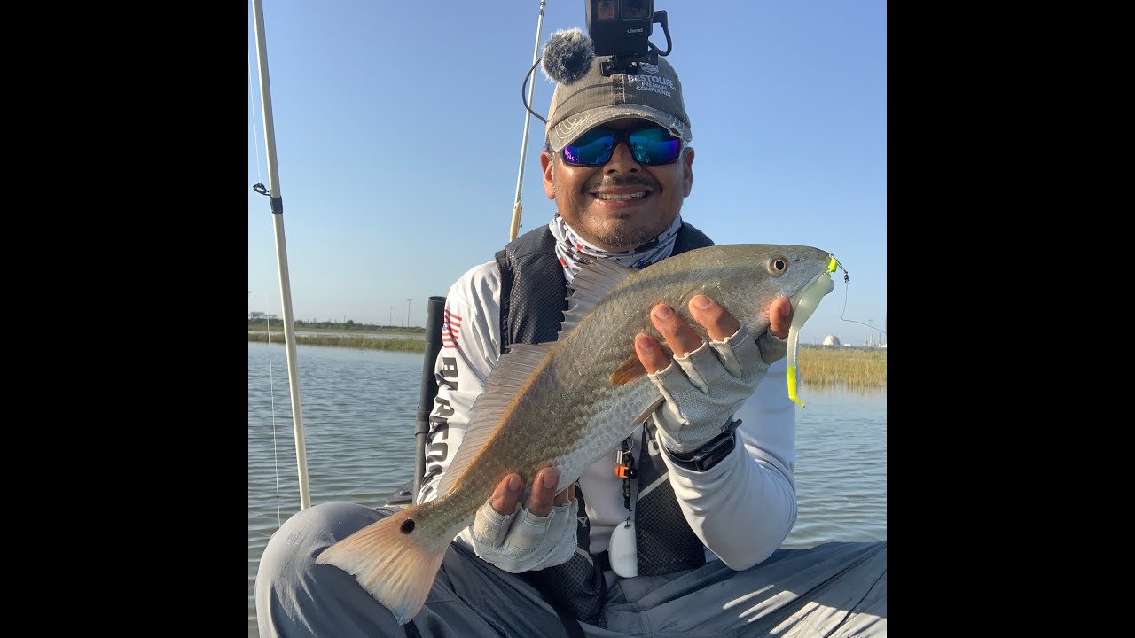 Kayak fishing for RedFish on Nueces River Back Lakes of the Mouth