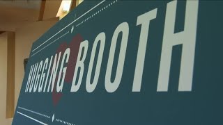 "Hugging Booth" allows WY long-term care residents a warm embrace with loved ones
