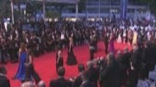 Actor Director Sean Penn walks the red carpet in Cannes with daughter Dylan Penn for 'Flag Day'
