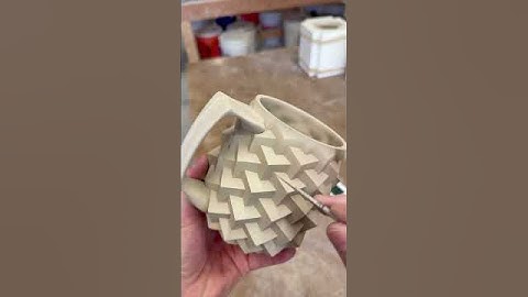 Making one of my newest designs the Super Cubes Mug. Handmade in high fire porcelain.