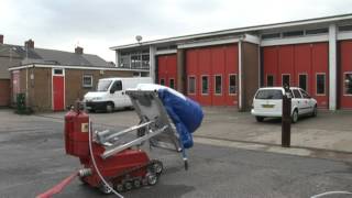 Firemote fire fighting robot deploying Waterwall Blast Protector