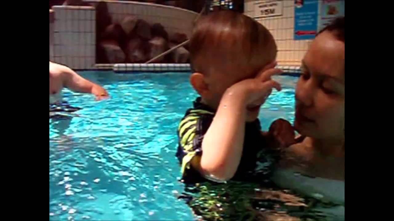 Little Baby Boy Swimming Underwater 