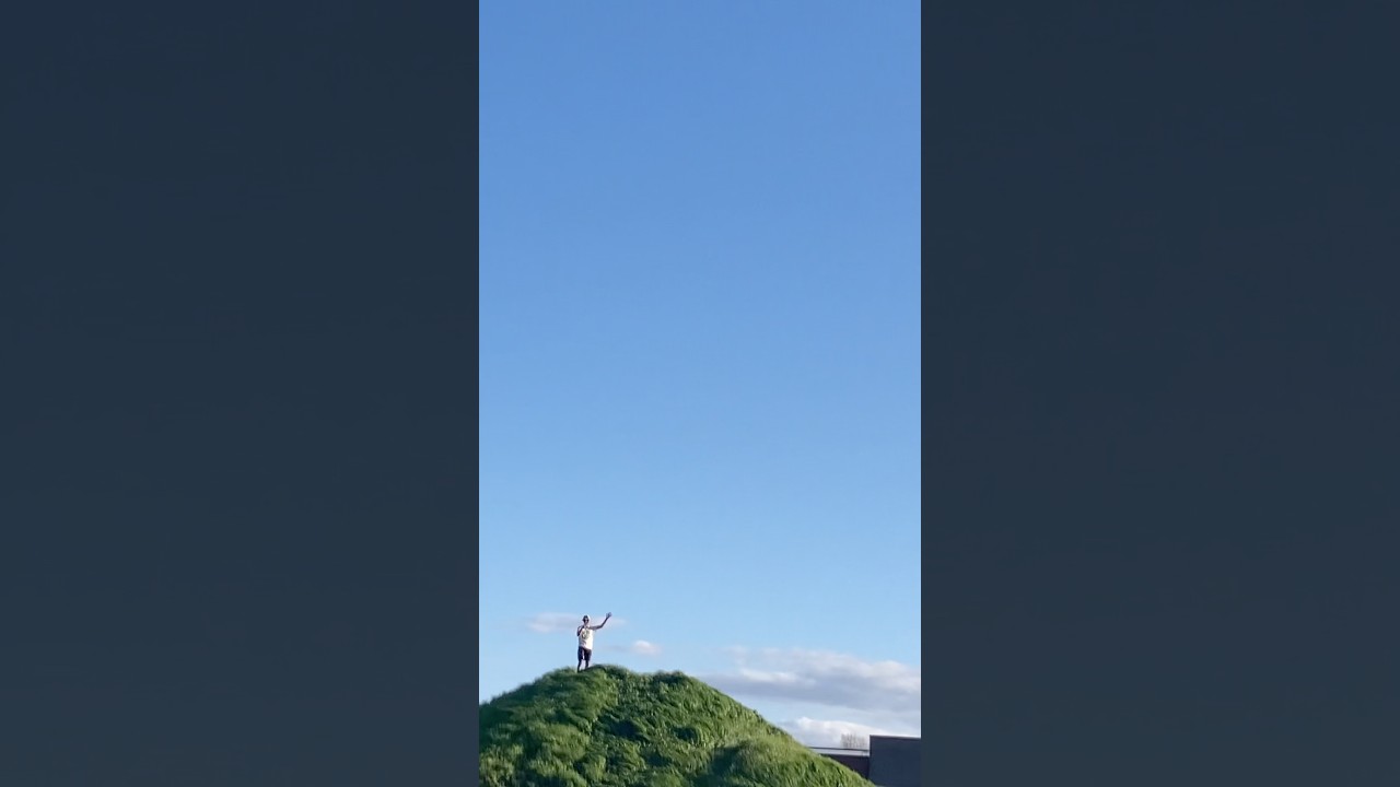 Climbing a grassy hill!