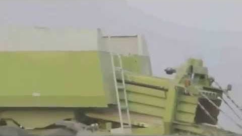 Farmer jumps into hay bale   machine  xD ^^