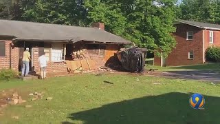 Vehicle crashes into home in Morganton