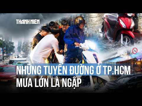 Which streets in HCMC flood whenever it rains hard?