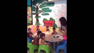 Young toddlers learning english with teacher grace