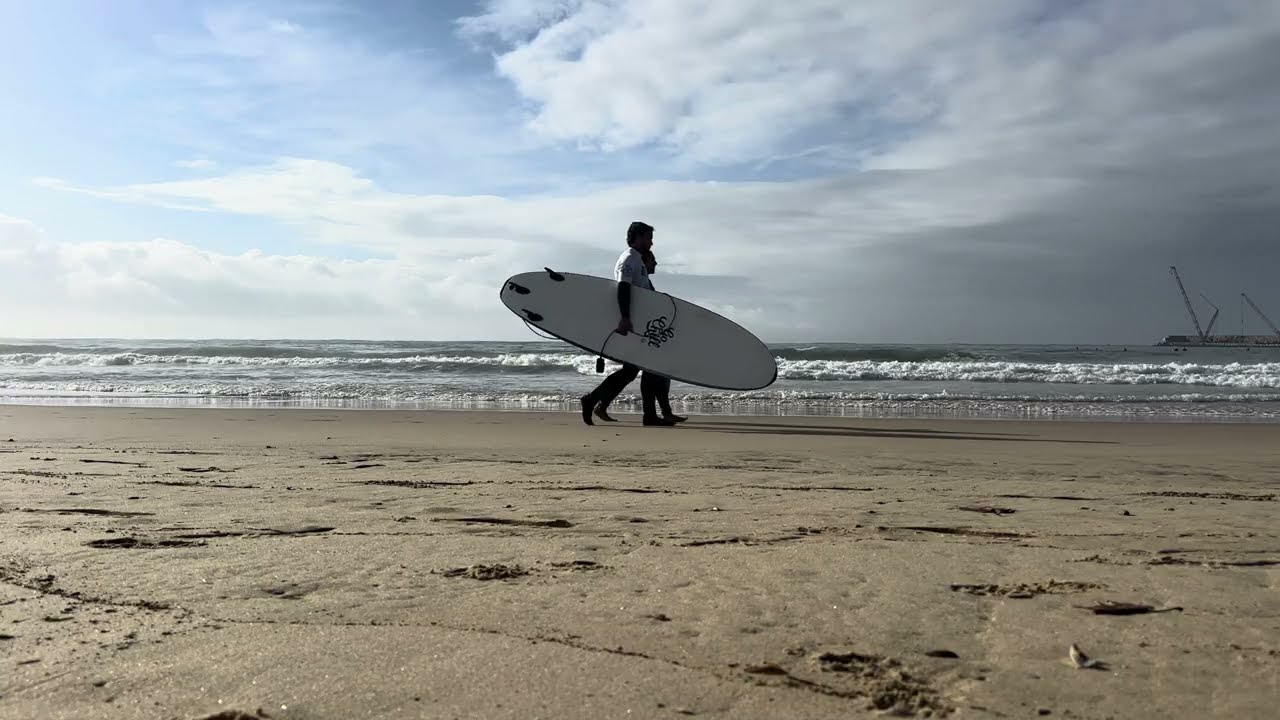 City beach by the ocean. Real coastal life and sounds
