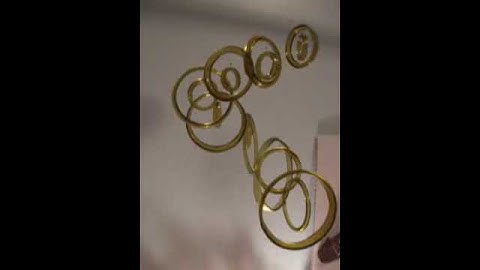 Recycled wine bottle made into windchimes