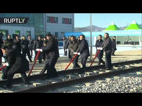 A historic moment: North and South Korean officials link railroads across border