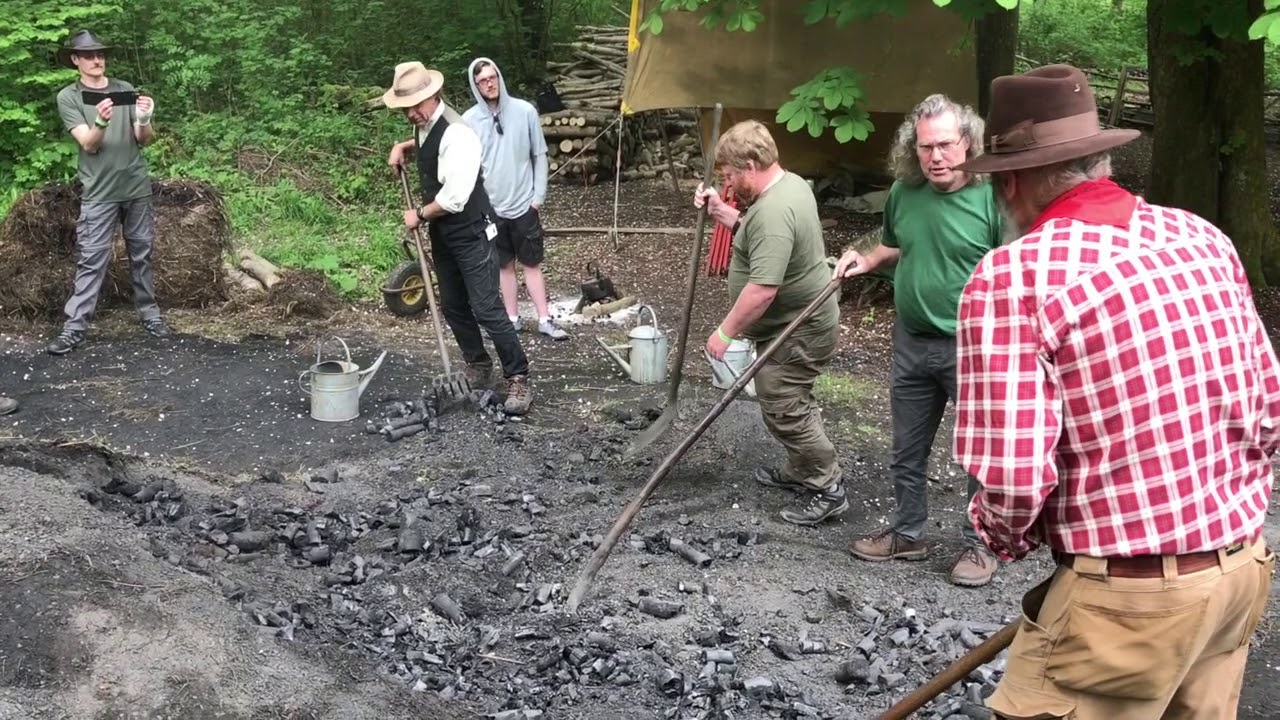 Opening up a traditional charcoal earth burn YouTube