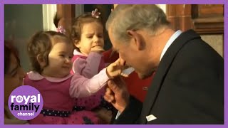 Babies Try To Pinch Prince Charles Nose ?