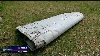 Family of man on MH370 awaits updates on found plane debris