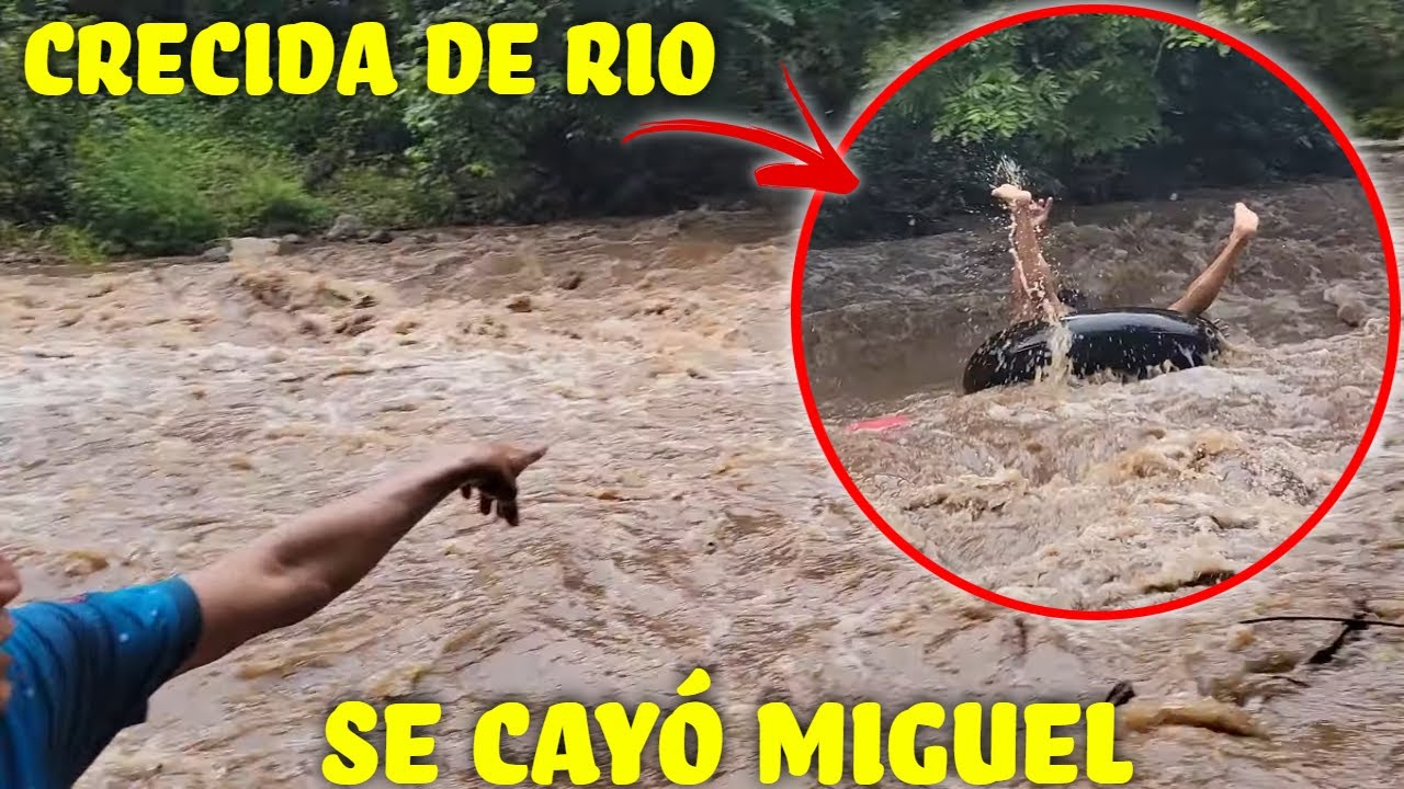 Gran crecida de rio captada en video. Vean como este Chico se cae del neumatico.