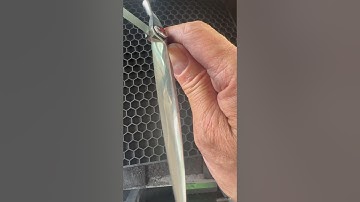 Rest your shears gently in a closed position on a soft surface or dedicated scissor mat.