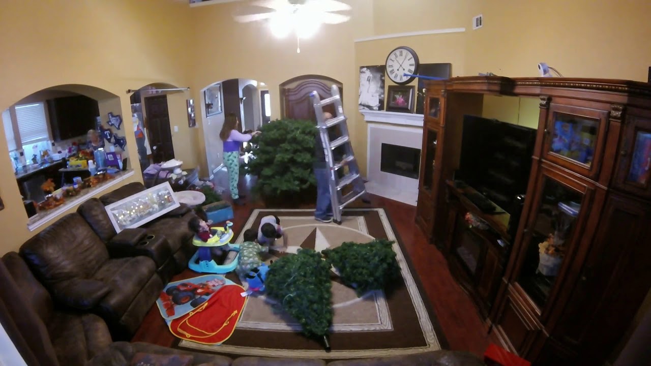 Setting up our 12 foot Christmas tree in fast motion. YouTube