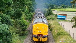 Log Train on the Cambrian Line Nr Caersws Powys.(4K).