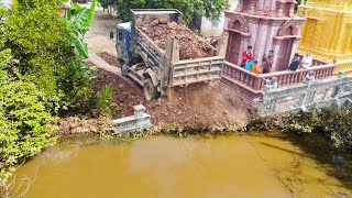 : Great work filling! Bulldozer and dump trucks pushing soil filling land
